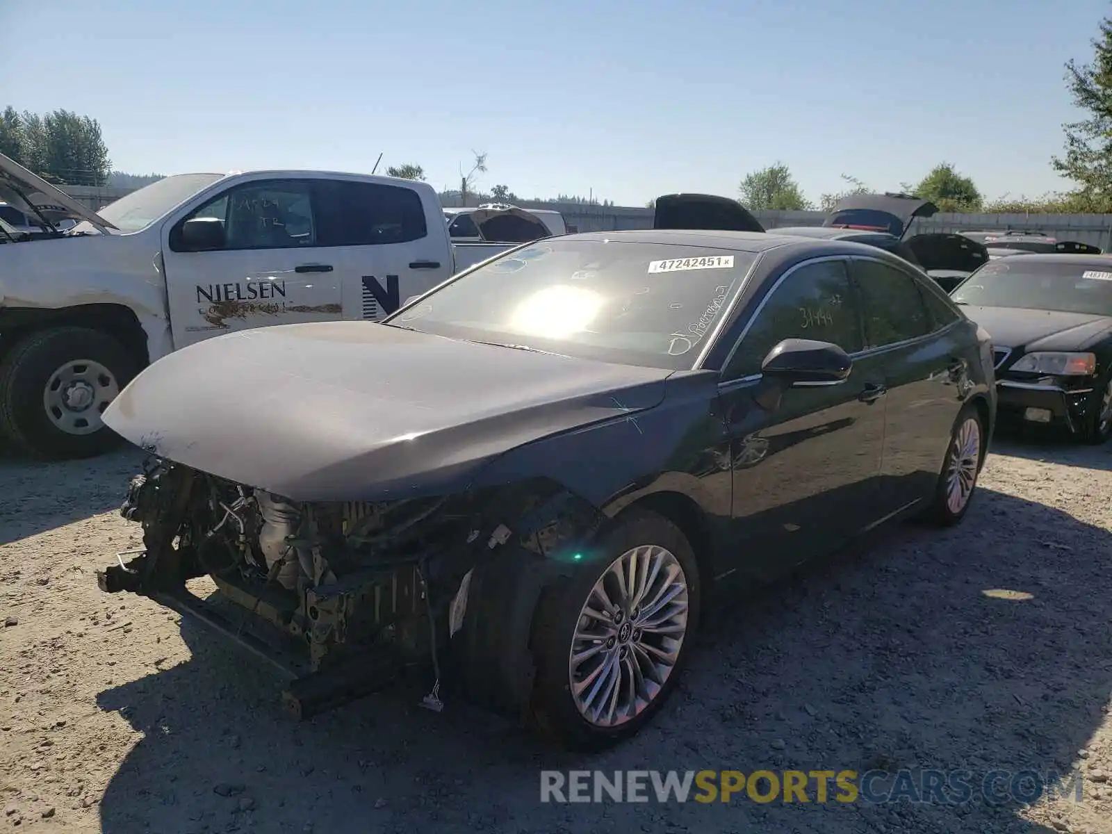 2 Photograph of a damaged car 4T1BZ1FB7KU015051 TOYOTA AVALON 2019