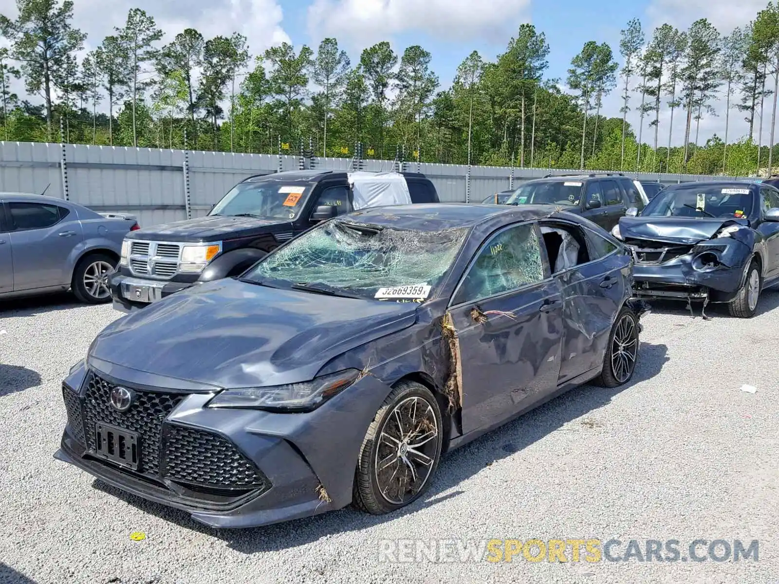 2 Photograph of a damaged car 4T1BZ1FB7KU016989 TOYOTA AVALON 2019