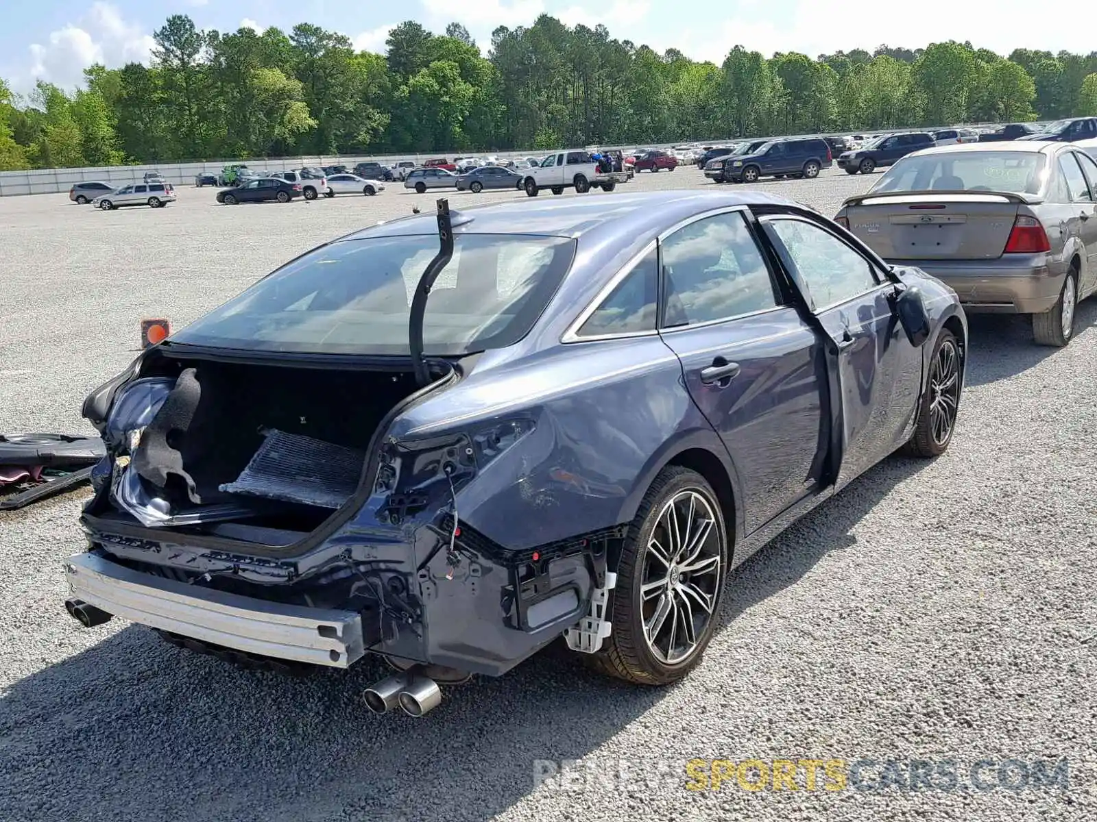 4 Photograph of a damaged car 4T1BZ1FB7KU016989 TOYOTA AVALON 2019