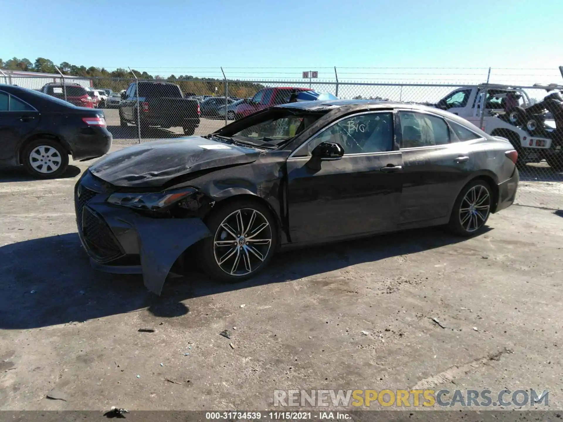 2 Photograph of a damaged car 4T1BZ1FB7KU017124 TOYOTA AVALON 2019