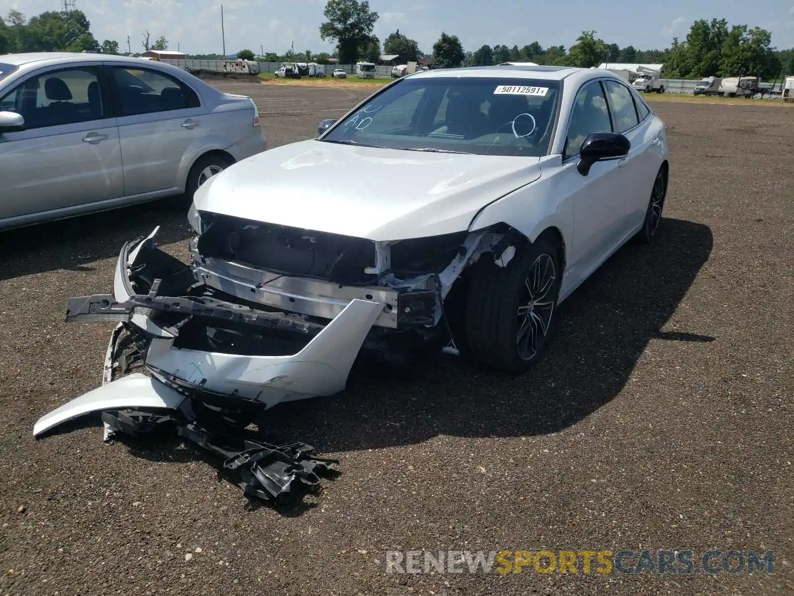 2 Photograph of a damaged car 4T1BZ1FB7KU022680 TOYOTA AVALON 2019