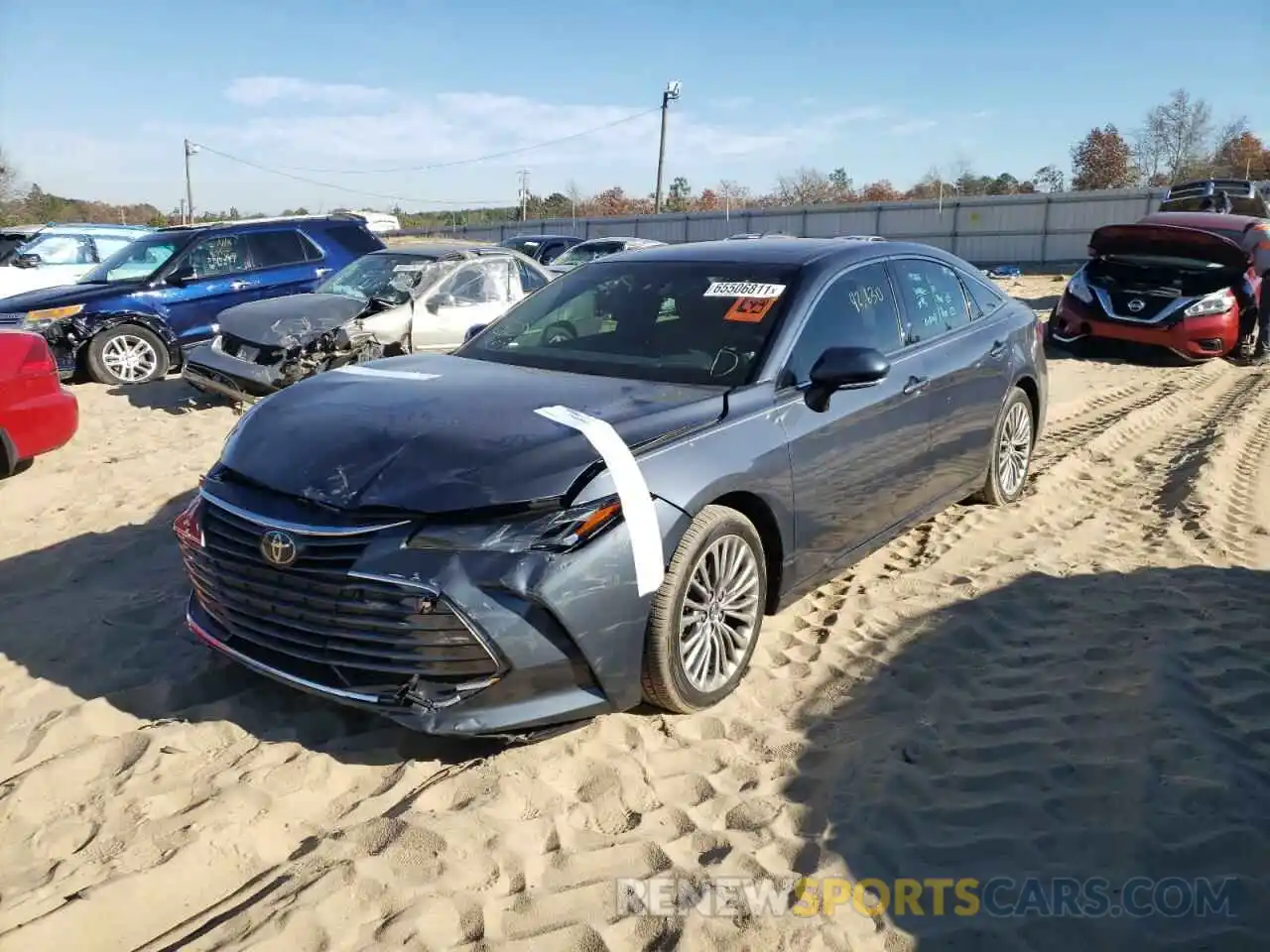 2 Photograph of a damaged car 4T1BZ1FB7KU035087 TOYOTA AVALON 2019