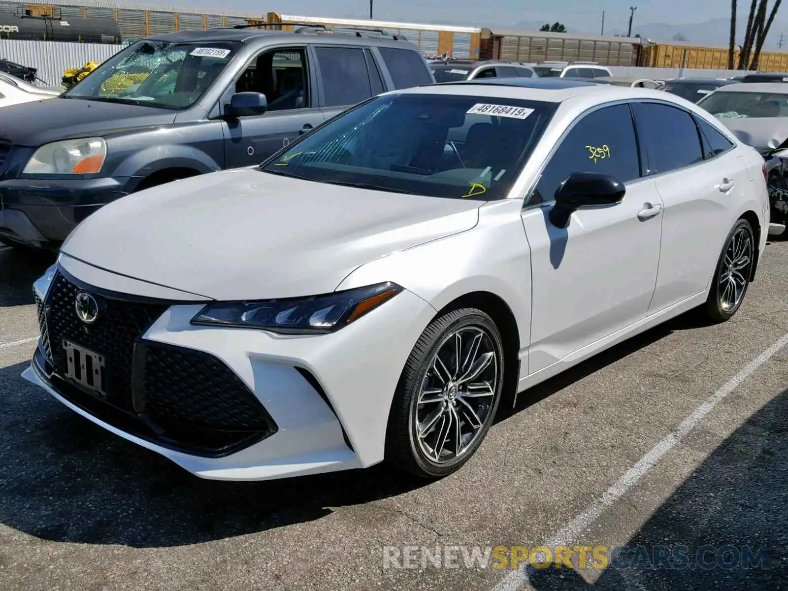 2 Photograph of a damaged car 4T1BZ1FB8KU022641 TOYOTA AVALON 2019