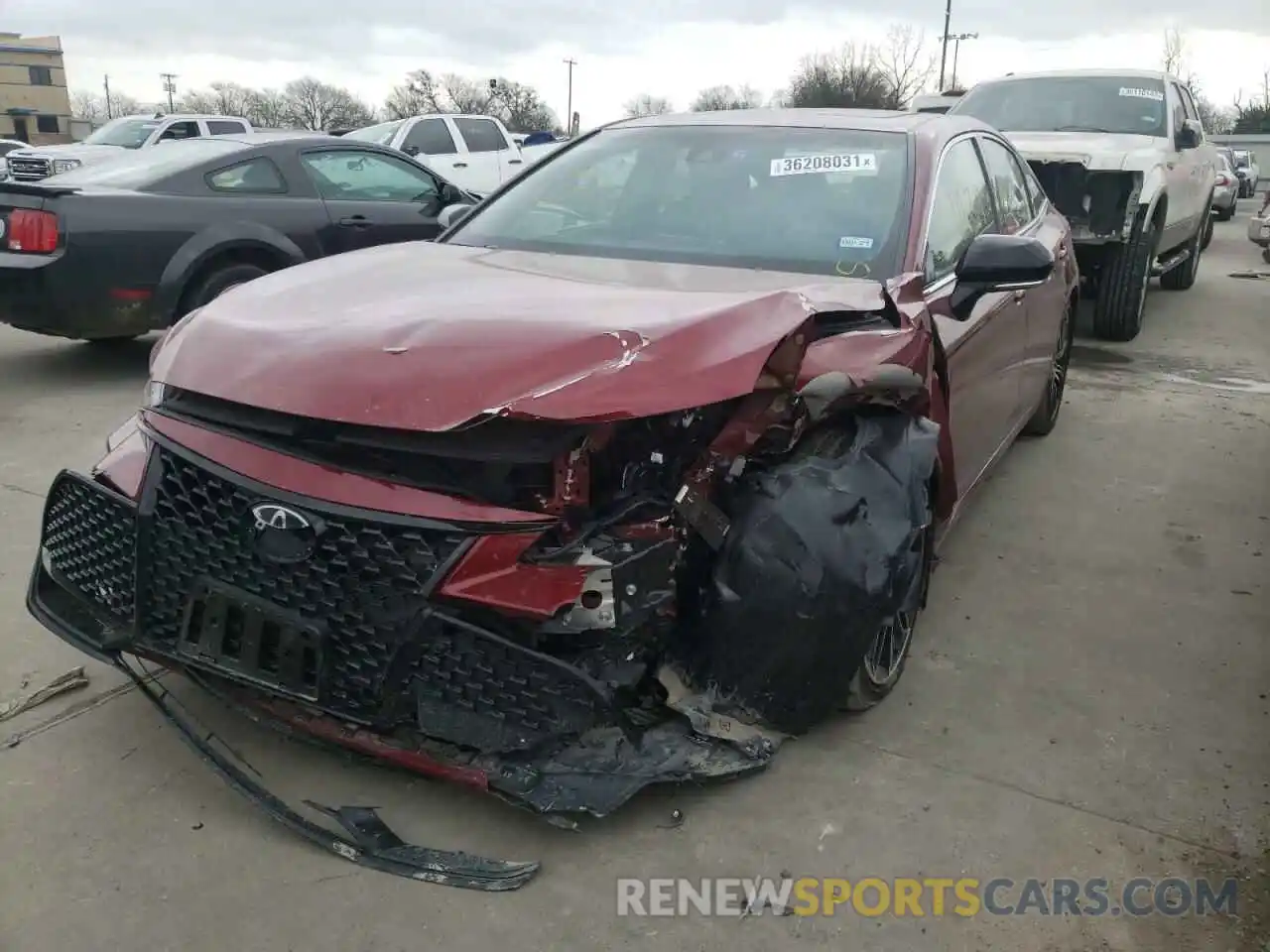 2 Photograph of a damaged car 4T1BZ1FB8KU033395 TOYOTA AVALON 2019