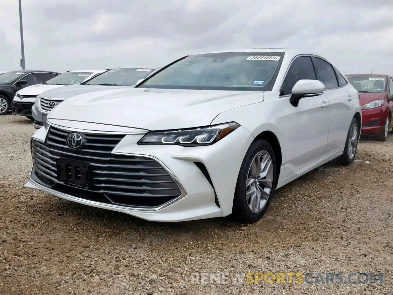 2 Photograph of a damaged car 4T1BZ1FB9KU003418 TOYOTA AVALON 2019