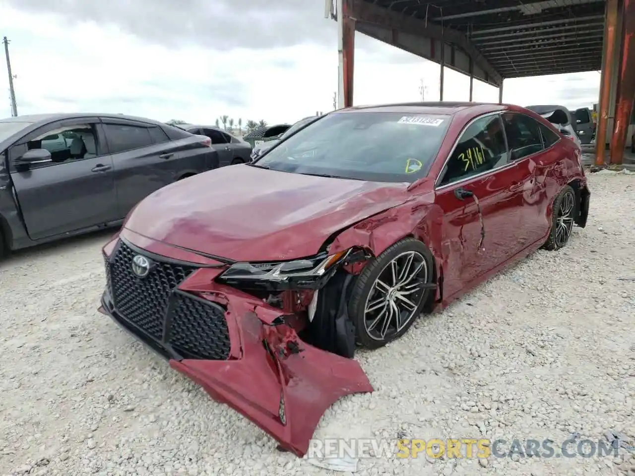 2 Photograph of a damaged car 4T1BZ1FB9KU007517 TOYOTA AVALON 2019