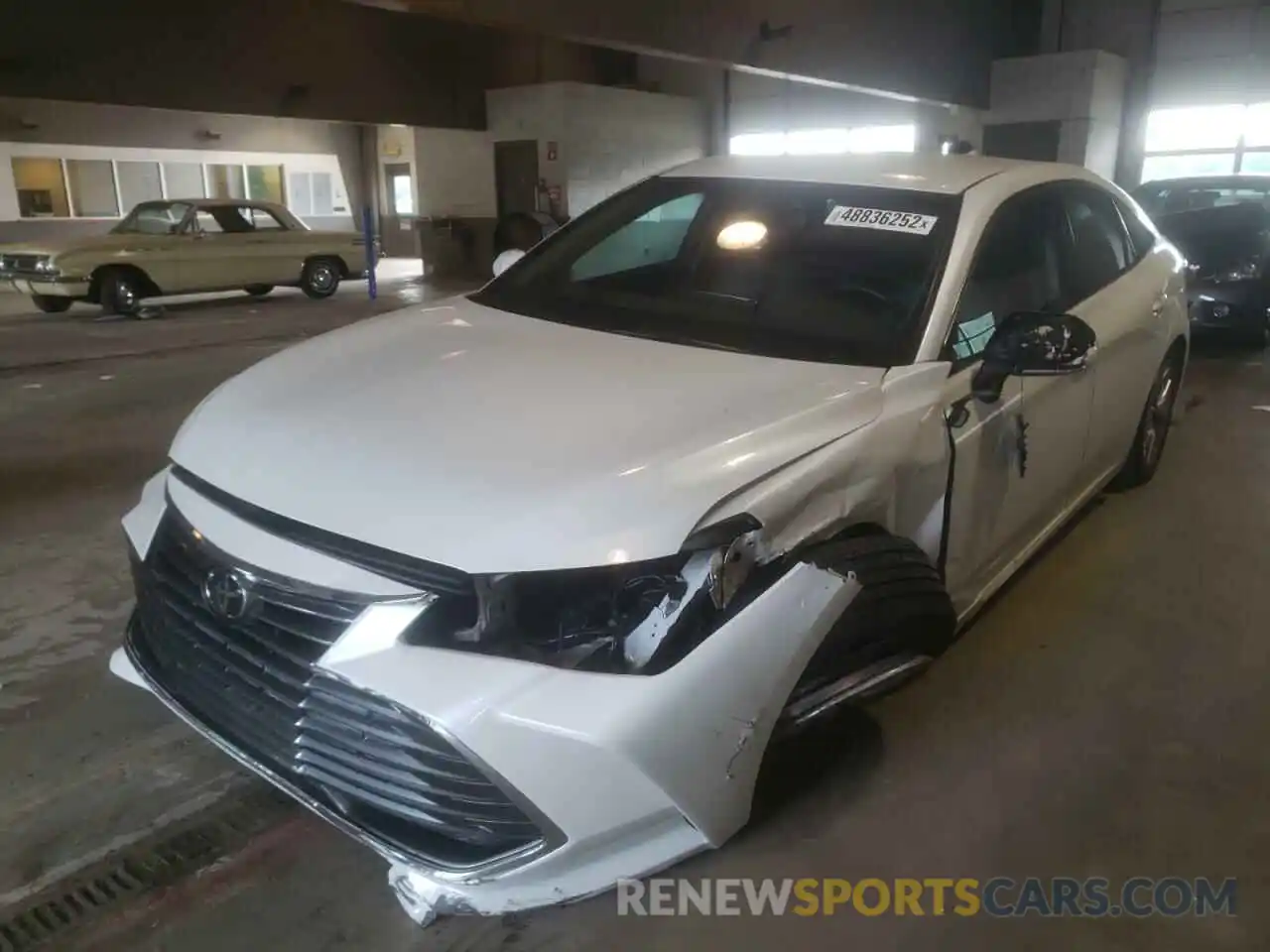 2 Photograph of a damaged car 4T1BZ1FB9KU008103 TOYOTA AVALON 2019