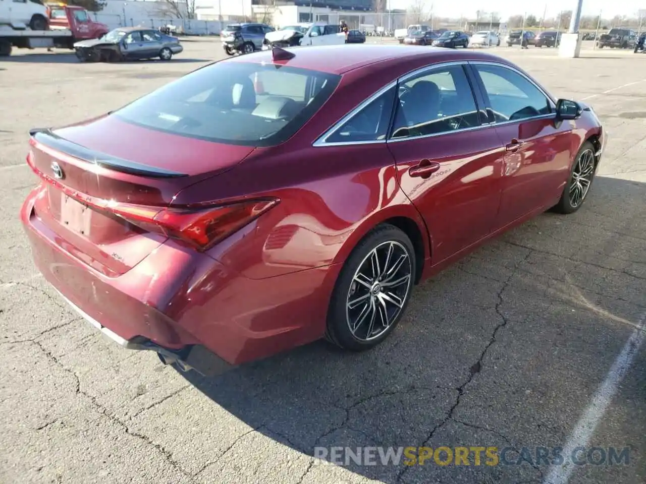 4 Photograph of a damaged car 4T1BZ1FB9KU010322 TOYOTA AVALON 2019