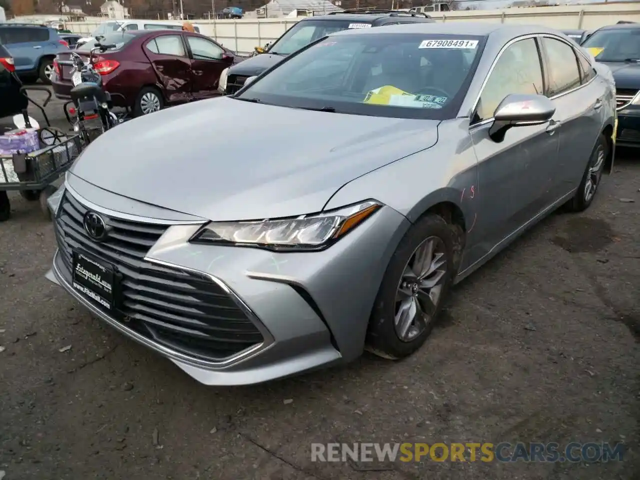 2 Photograph of a damaged car 4T1BZ1FB9KU026388 TOYOTA AVALON 2019