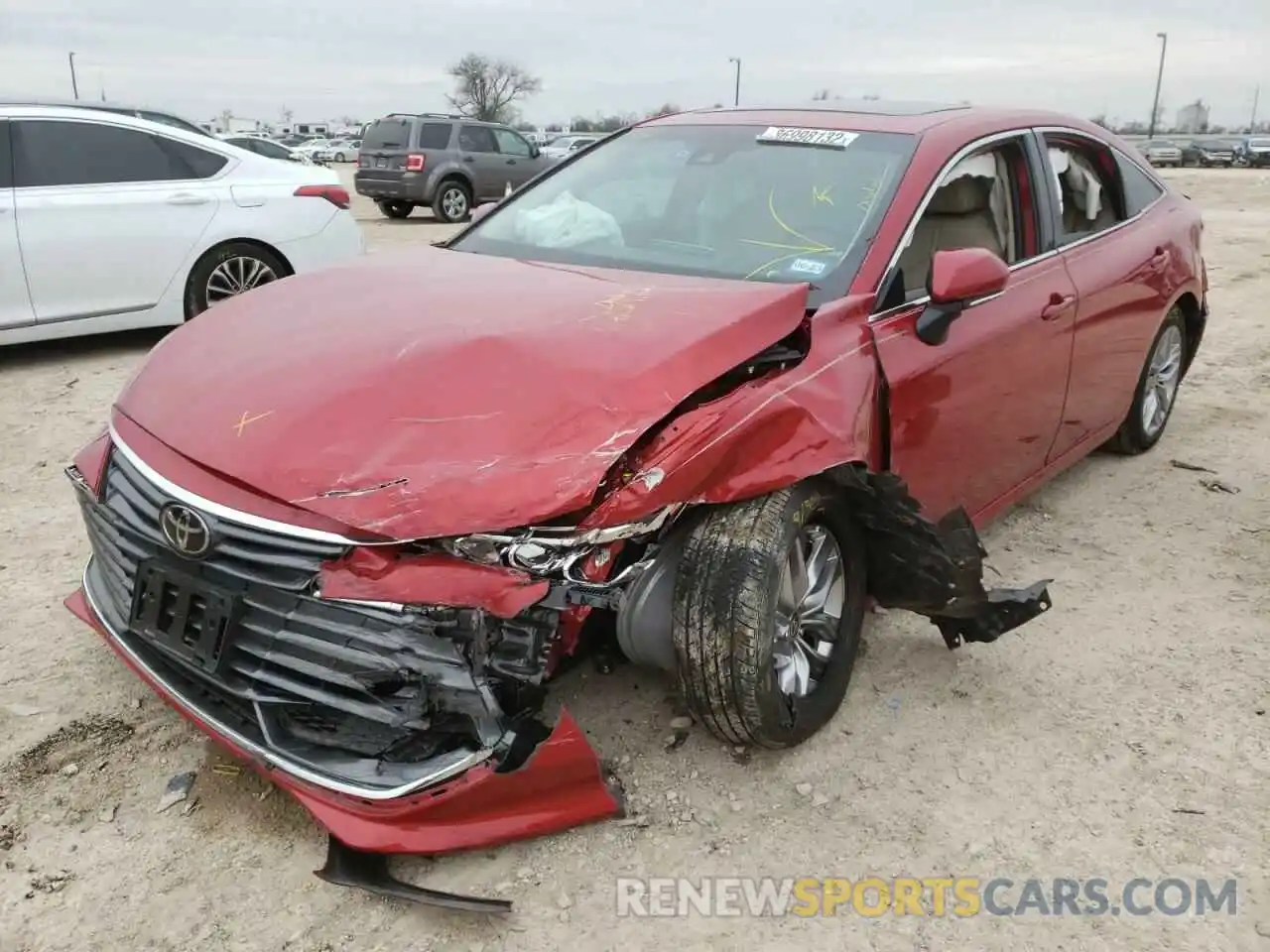 2 Photograph of a damaged car 4T1AZ1FB5MU067566 TOYOTA AVALON 2021