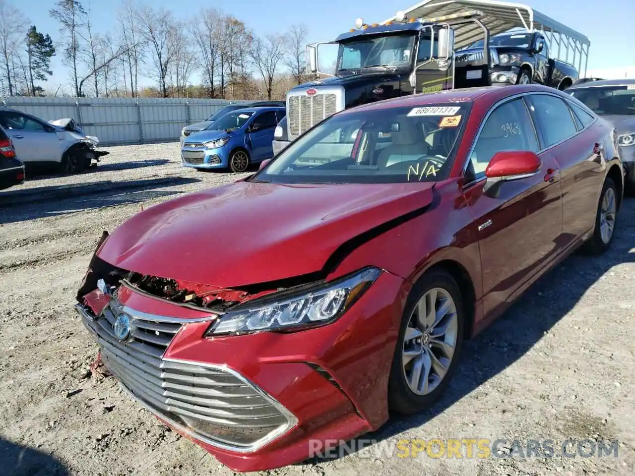 2 Photograph of a damaged car 4T1JA1AB0MU002106 TOYOTA AVALON 2021