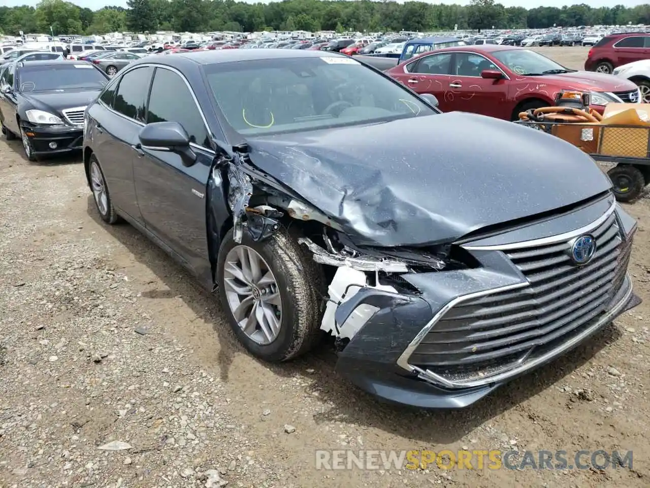 1 Photograph of a damaged car 4T1JA1AB0MU010156 TOYOTA AVALON 2021