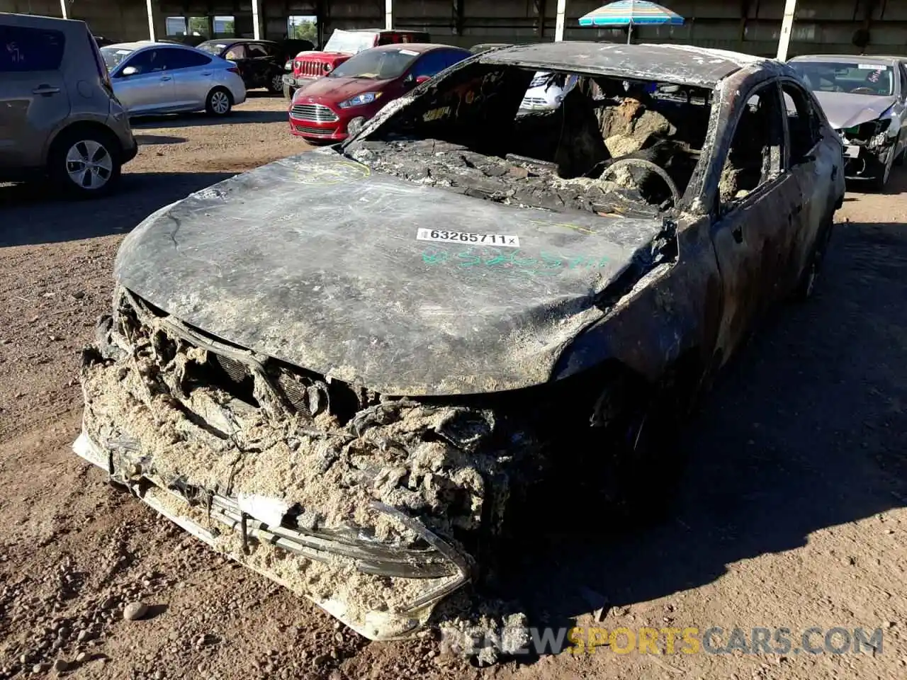 2 Photograph of a damaged car 4T1JZ1FB5MU060052 TOYOTA AVALON 2021