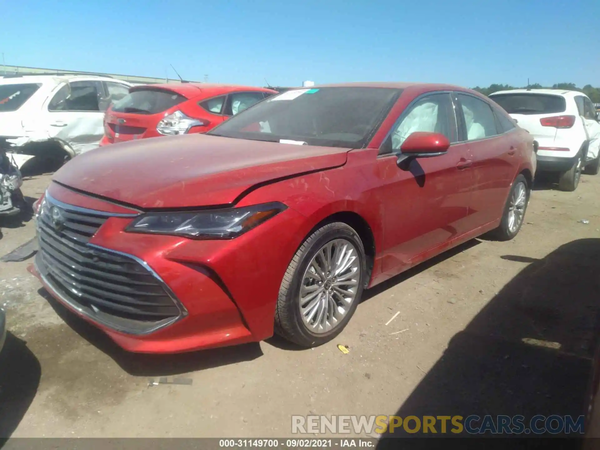 2 Photograph of a damaged car 4T1NB1BB1MU001351 TOYOTA AVALON 2021