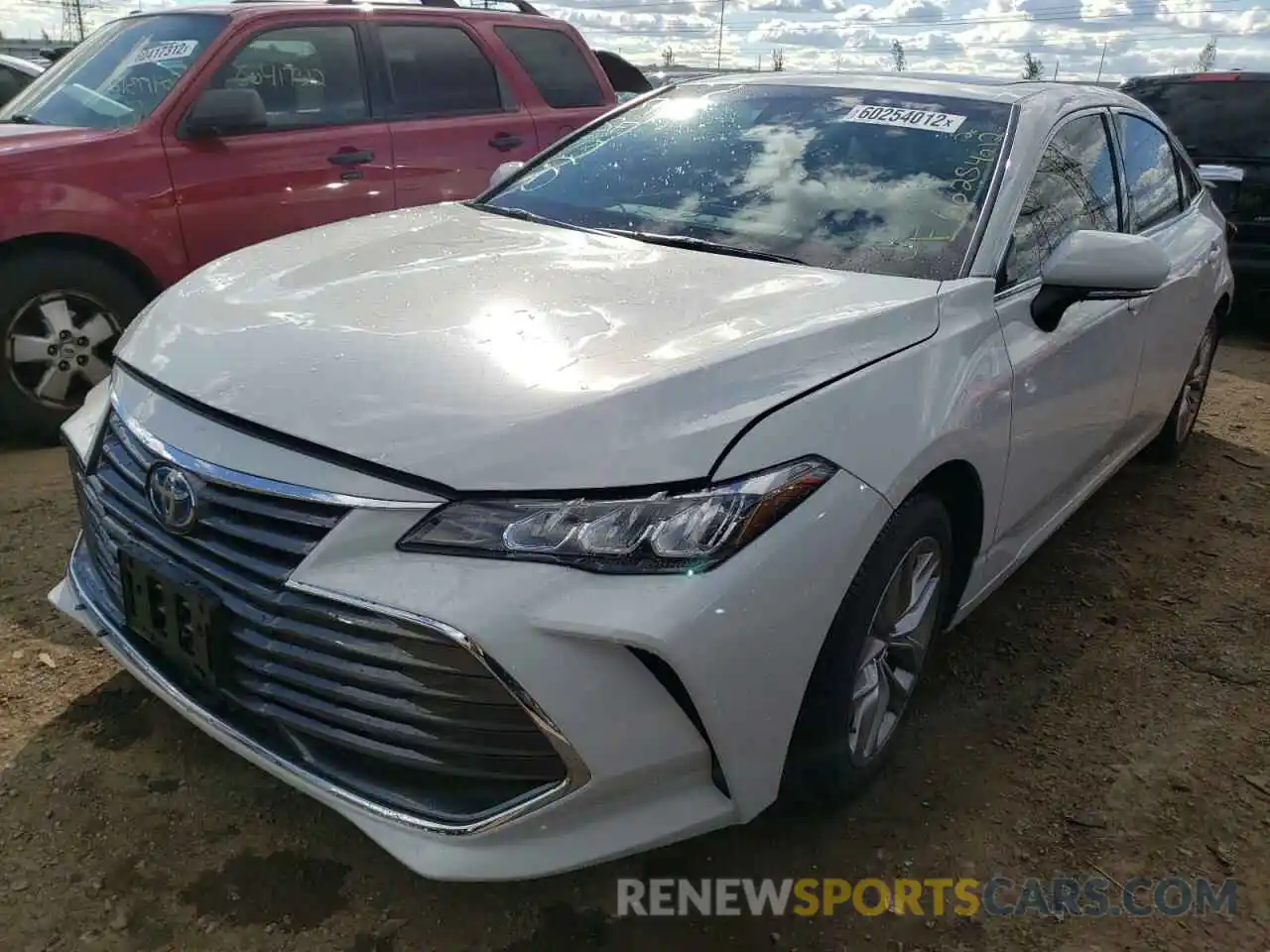 2 Photograph of a damaged car 4T1AA1AB9NU013803 TOYOTA AVALON 2022