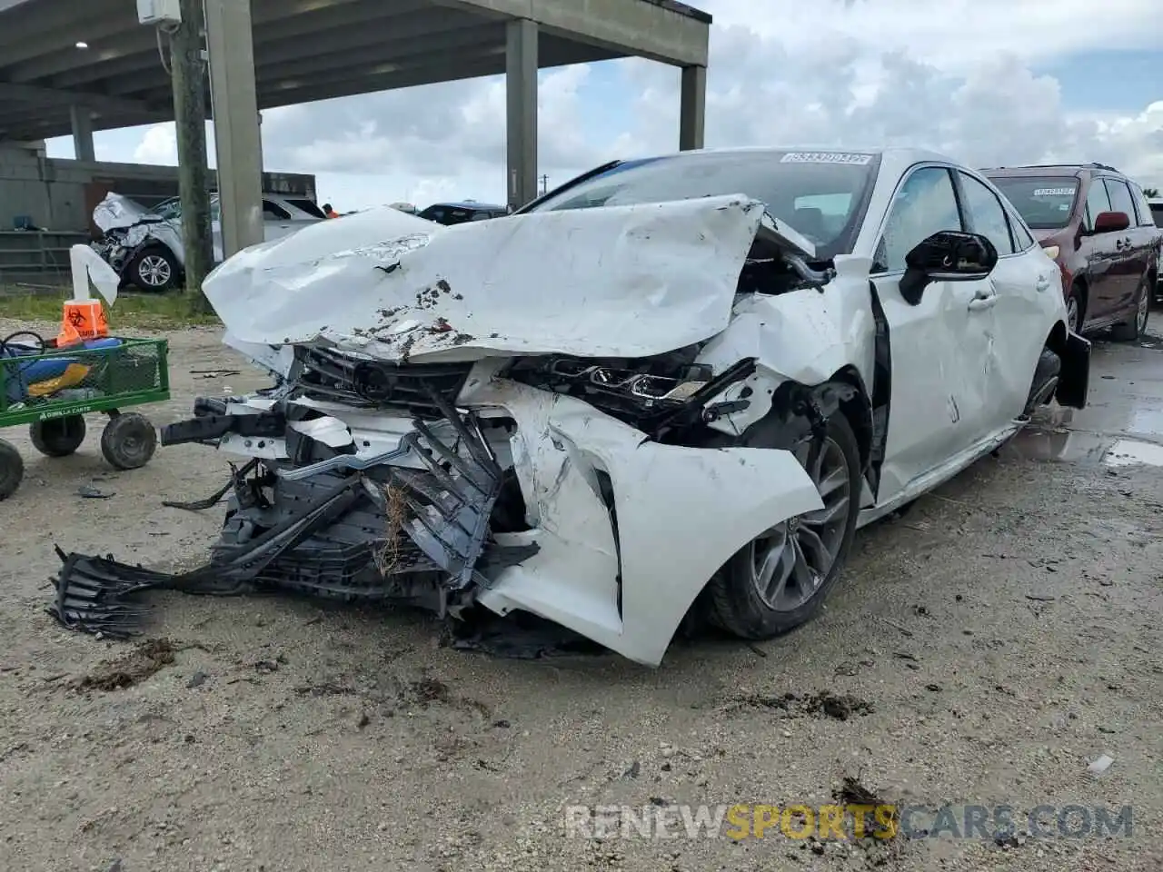 2 Photograph of a damaged car 4T1JZ1FB9NU079916 TOYOTA AVALON 2022