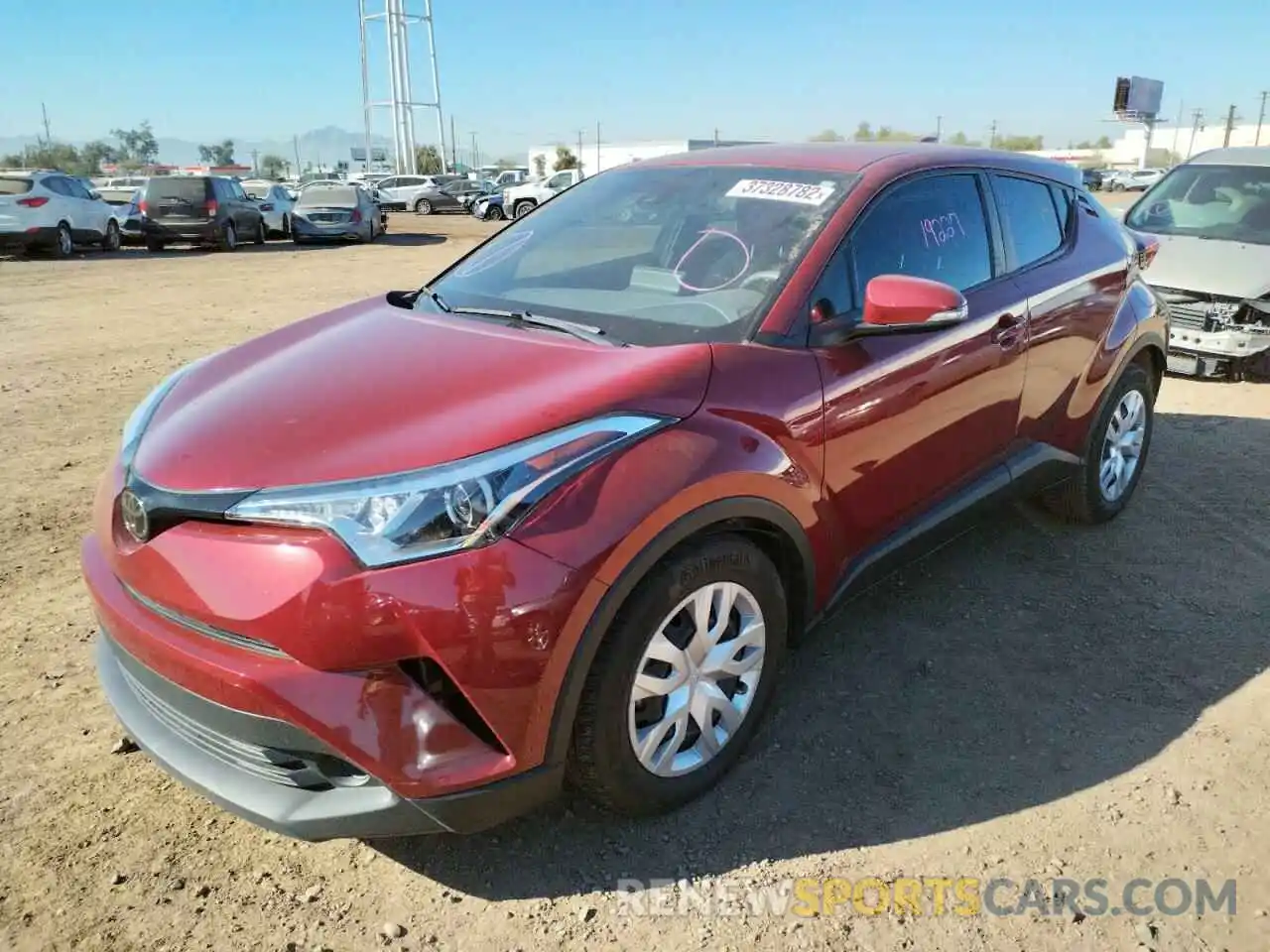 2 Photograph of a damaged car JTNKHMBX0K1022009 TOYOTA C-HR 2019