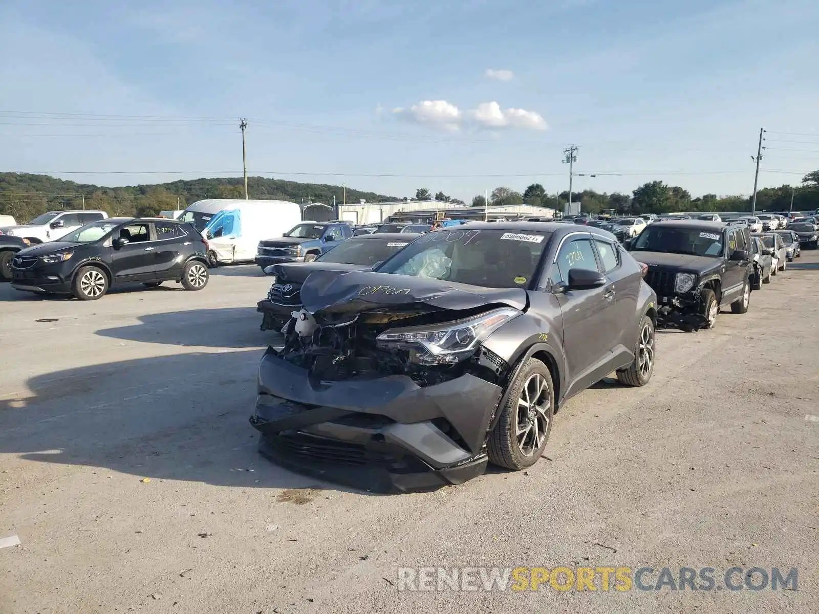 2 Photograph of a damaged car JTNKHMBX0K1033009 TOYOTA C-HR 2019