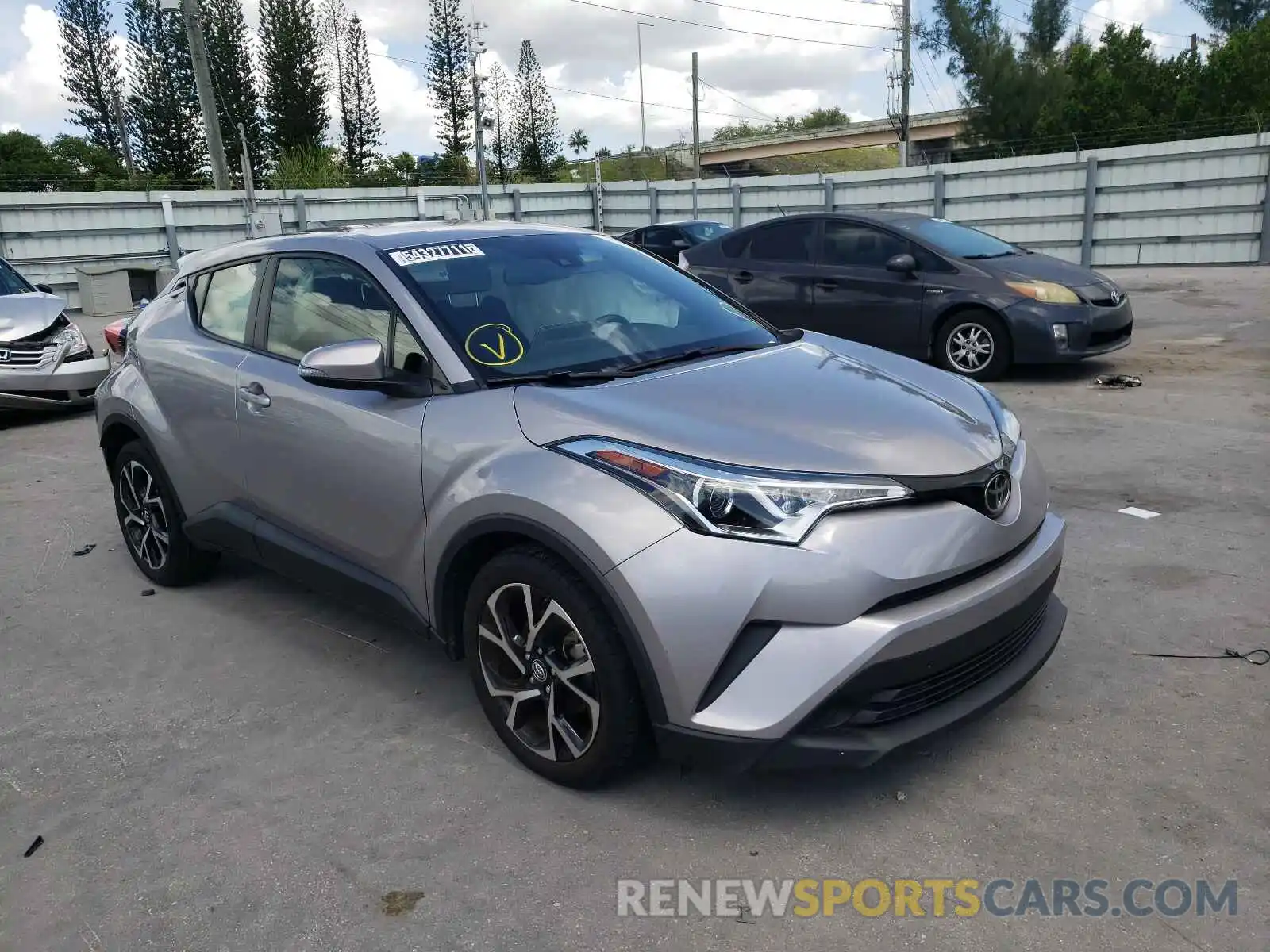 1 Photograph of a damaged car JTNKHMBX0K1037299 TOYOTA C-HR 2019