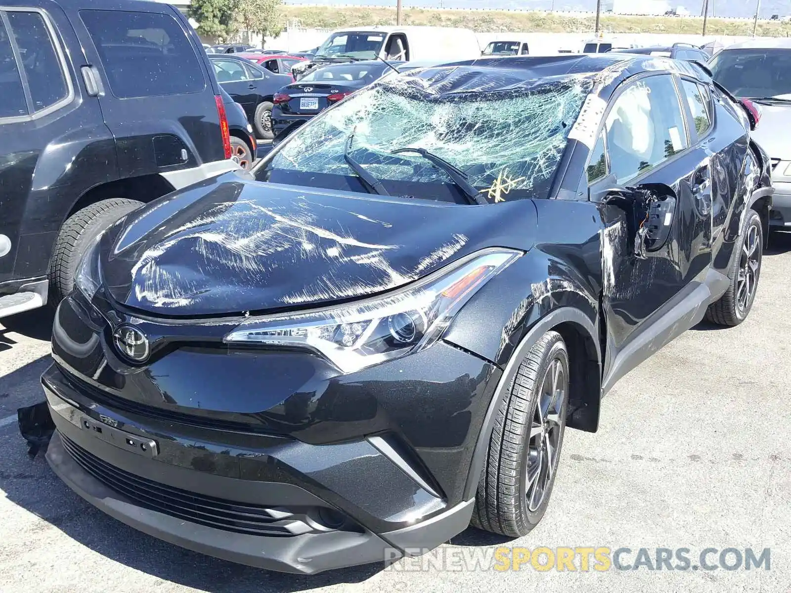 2 Photograph of a damaged car JTNKHMBX0K1048562 TOYOTA C-HR 2019