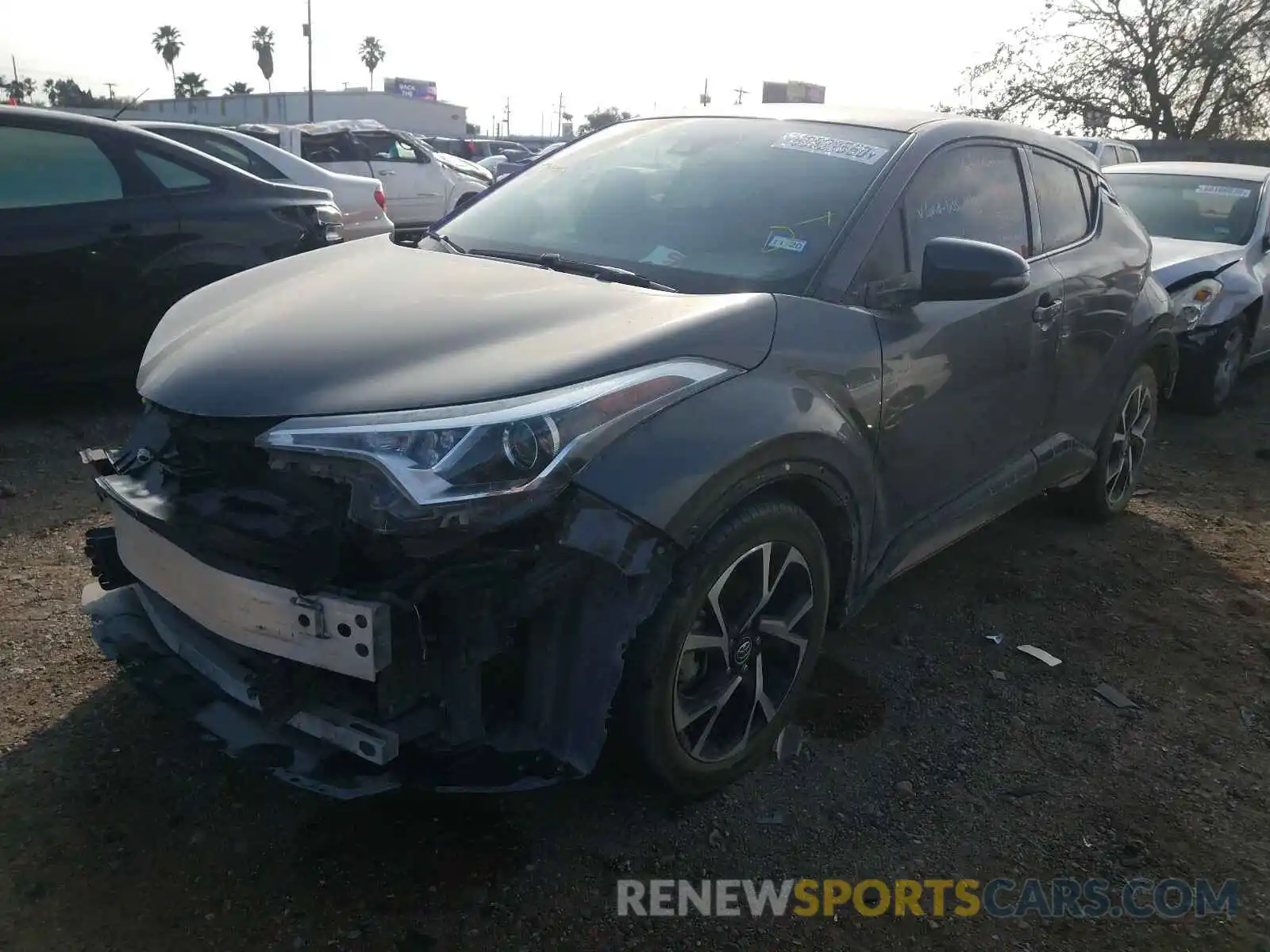 2 Photograph of a damaged car JTNKHMBX1K1015022 TOYOTA C-HR 2019