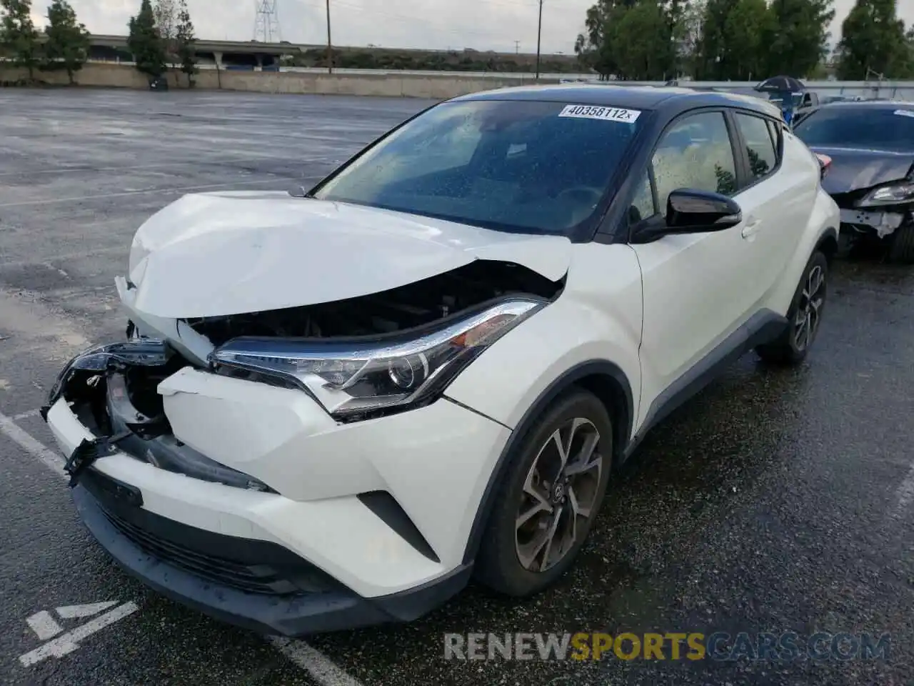 2 Photograph of a damaged car JTNKHMBX1K1030877 TOYOTA C-HR 2019