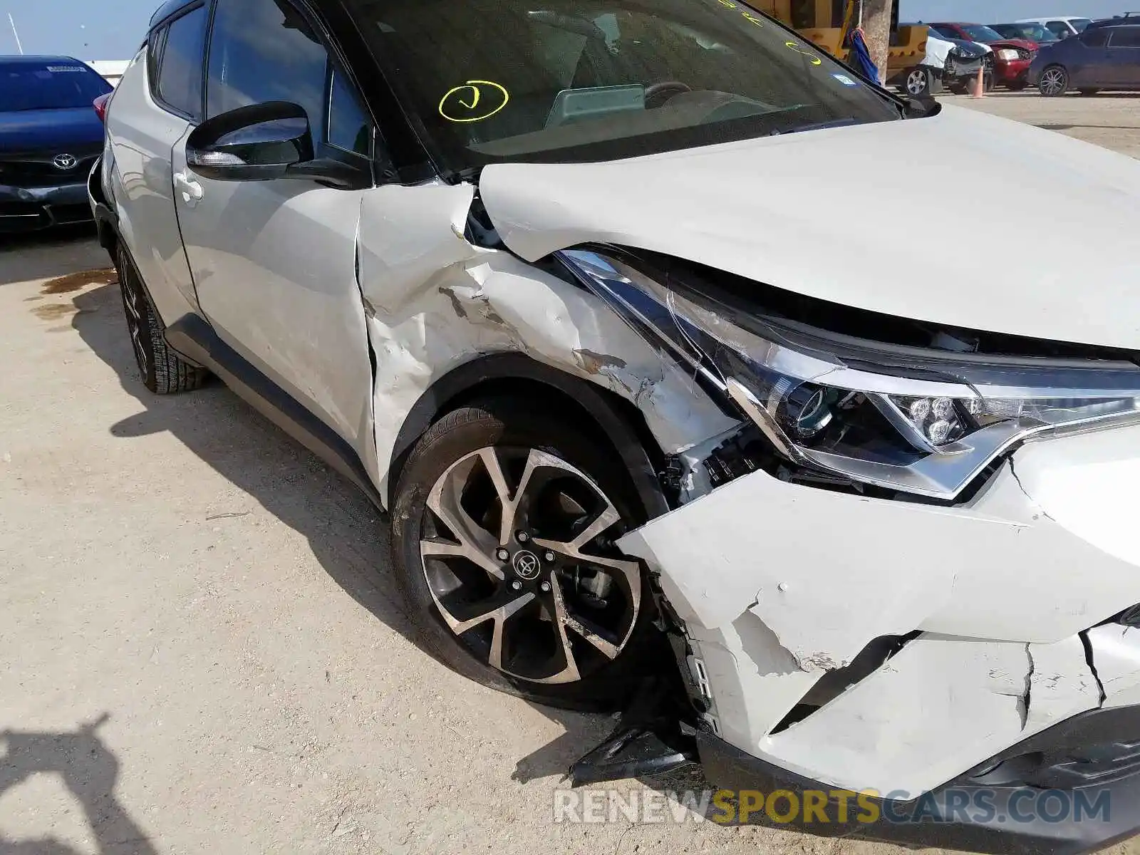 9 Фотография поврежденного автомобиля JTNKHMBX1K1057402 TOYOTA C-HR 2019