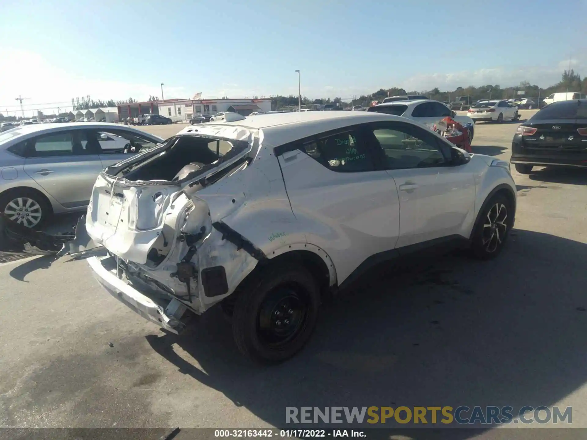 4 Photograph of a damaged car JTNKHMBX2K1020035 TOYOTA C-HR 2019