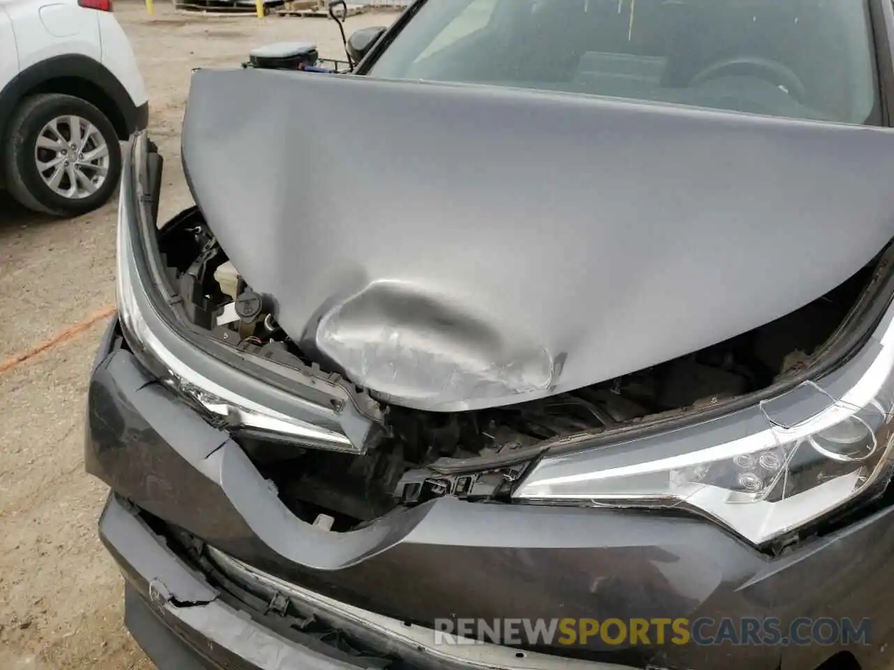 7 Photograph of a damaged car JTNKHMBX2K1030788 TOYOTA C-HR 2019