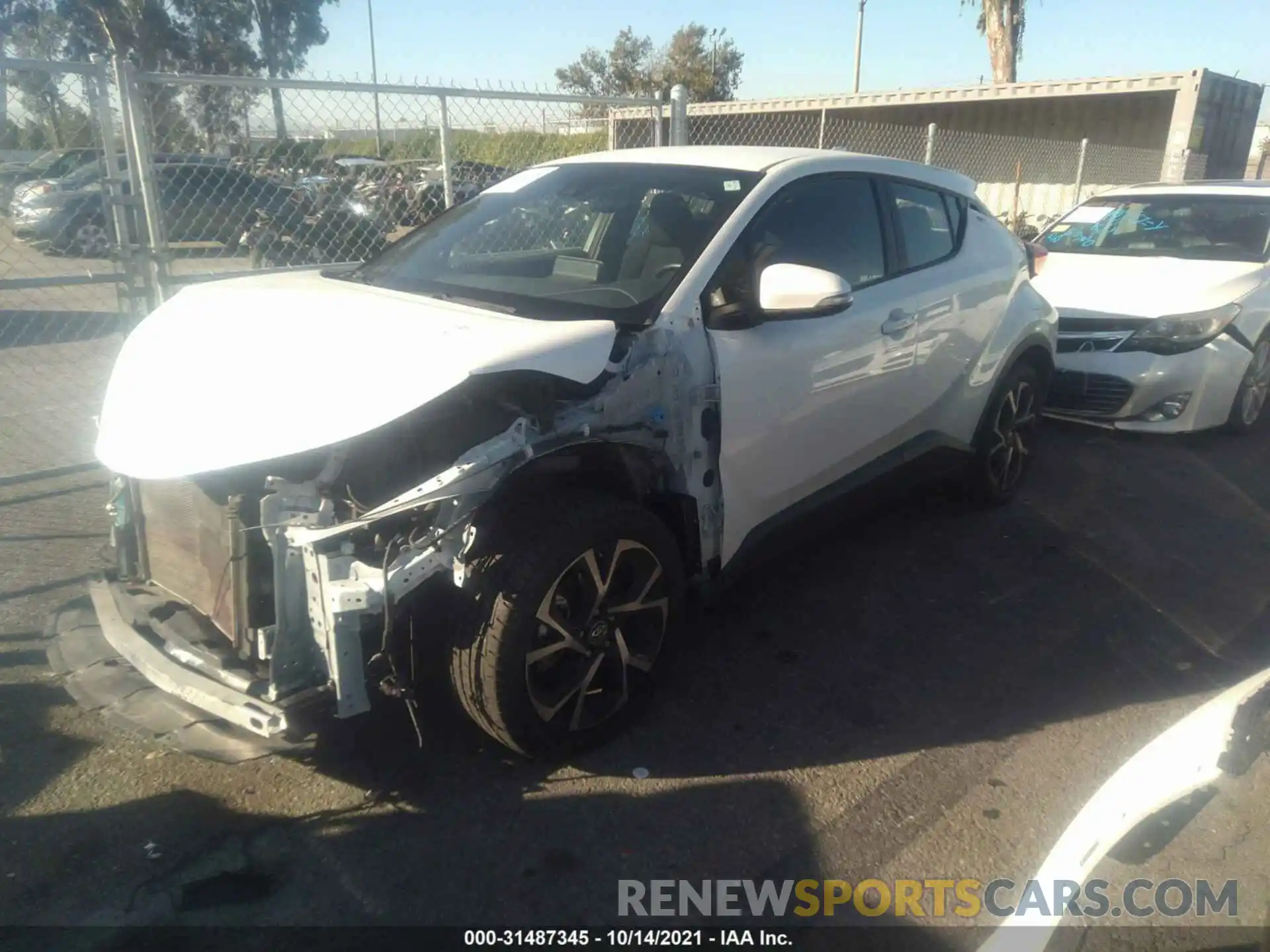 2 Photograph of a damaged car JTNKHMBX2K1031469 TOYOTA C-HR 2019