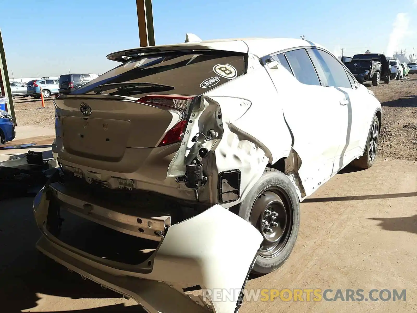 4 Photograph of a damaged car JTNKHMBX2K1040589 TOYOTA C-HR 2019