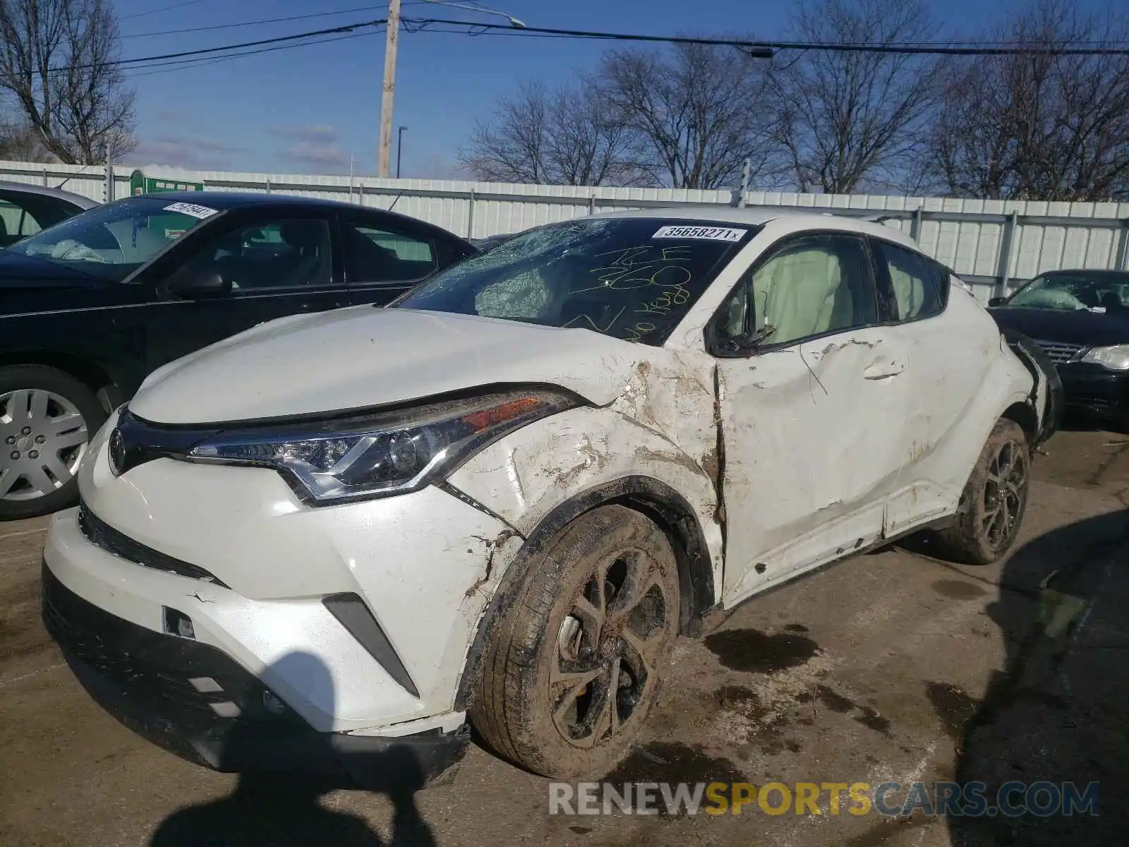 2 Photograph of a damaged car JTNKHMBX2K1054380 TOYOTA C-HR 2019