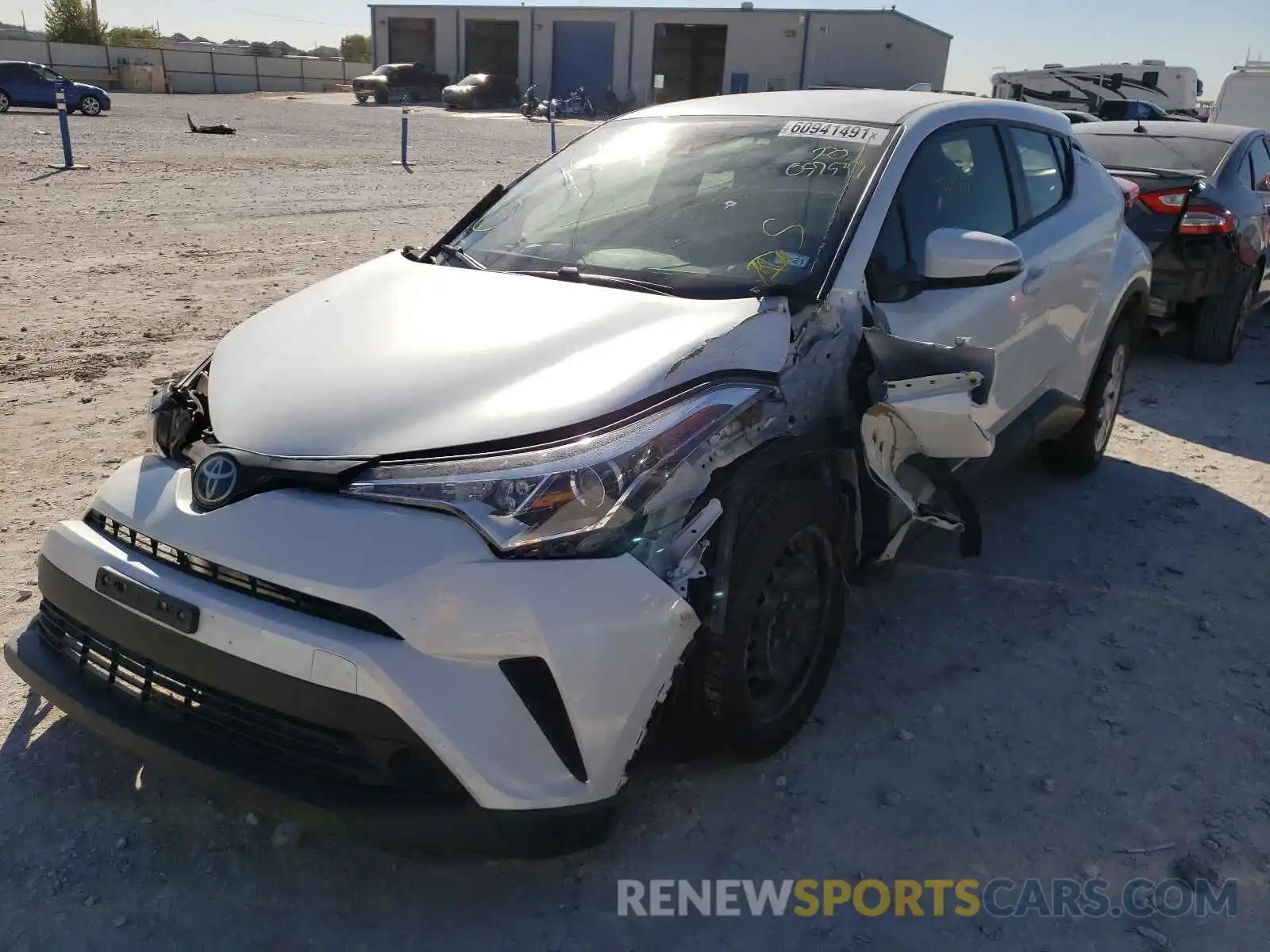 2 Photograph of a damaged car JTNKHMBX2K1057537 TOYOTA C-HR 2019