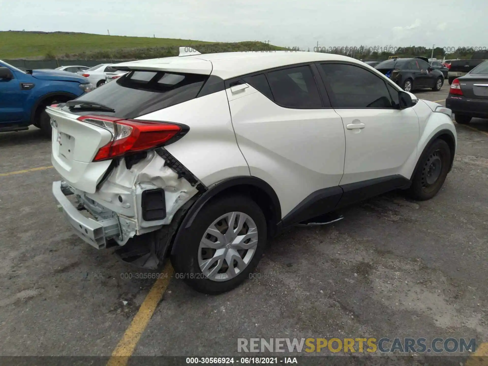 4 Photograph of a damaged car JTNKHMBX3K1035921 TOYOTA C-HR 2019