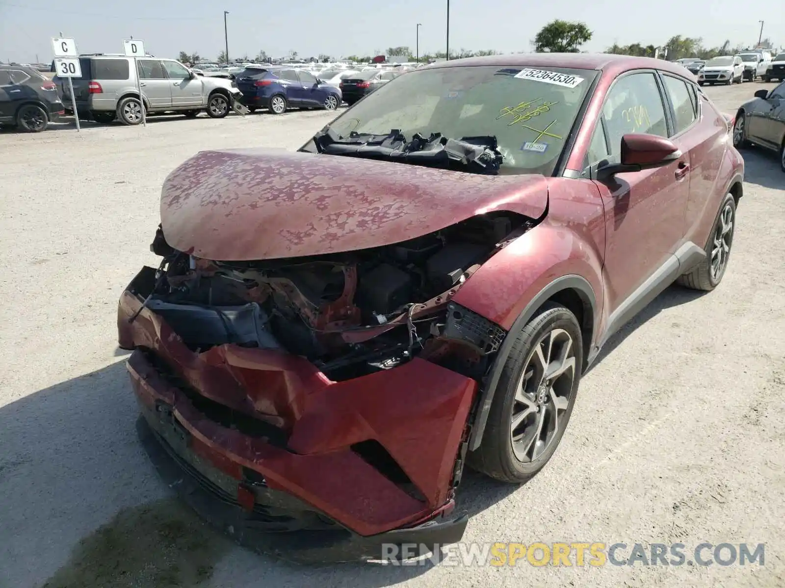 2 Photograph of a damaged car JTNKHMBX4K1021140 TOYOTA C-HR 2019