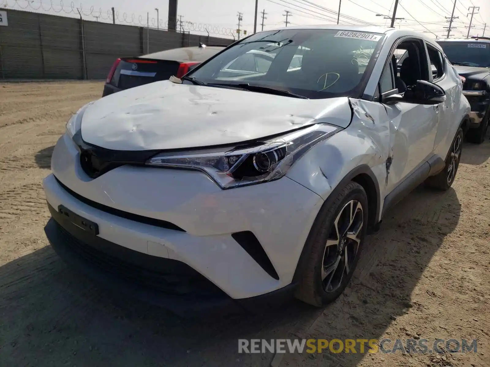 2 Photograph of a damaged car JTNKHMBX4K1022921 TOYOTA C-HR 2019