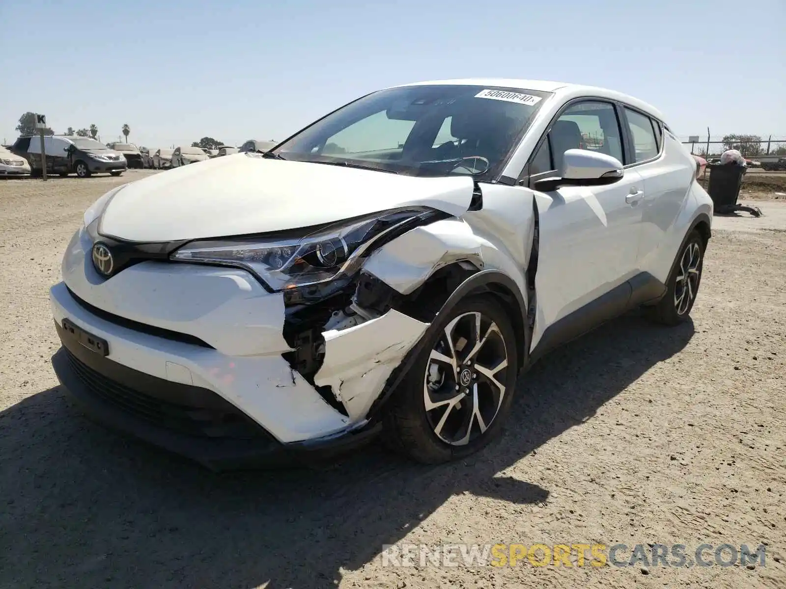 2 Photograph of a damaged car JTNKHMBX4K1038066 TOYOTA C-HR 2019