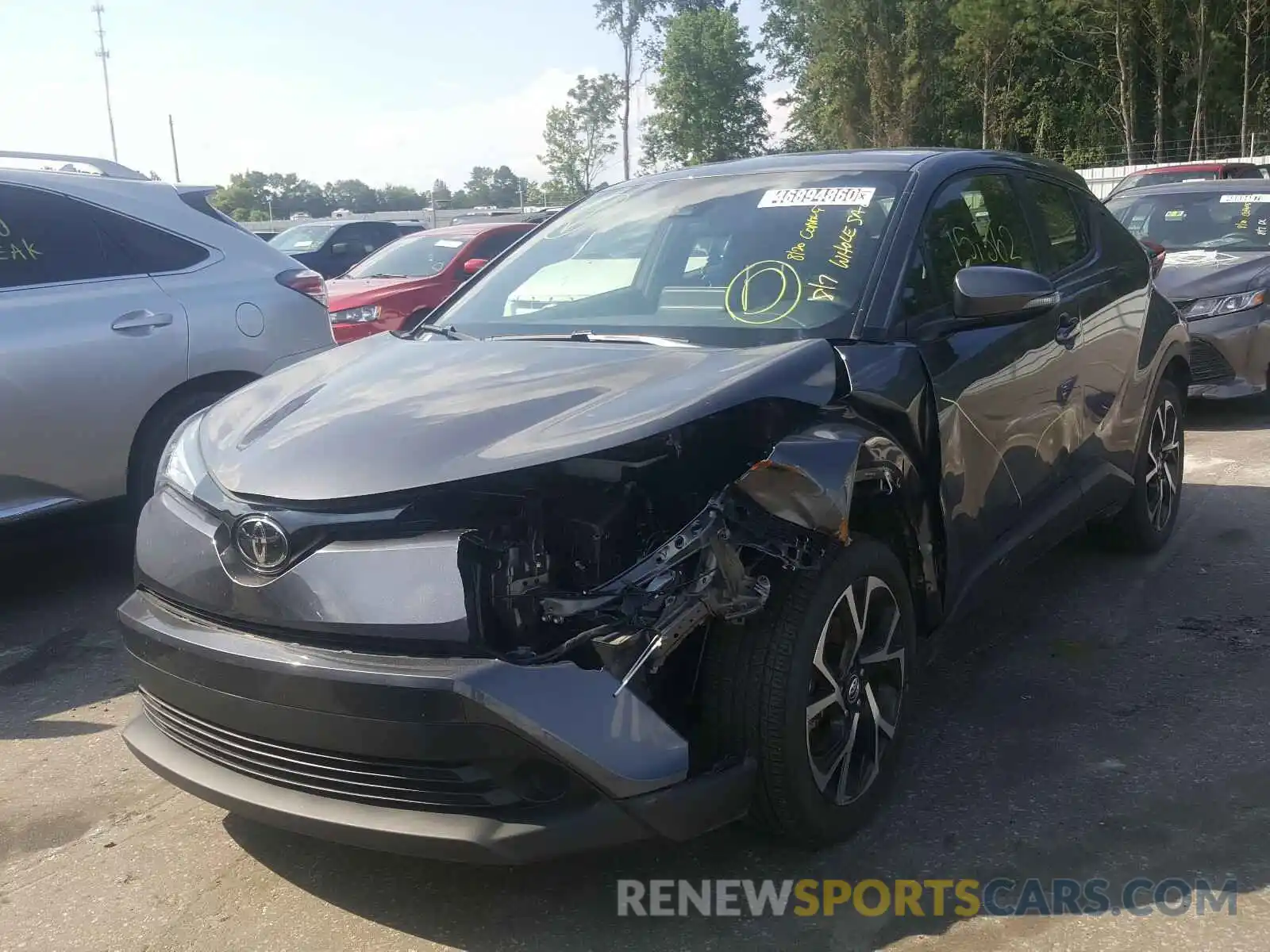 2 Photograph of a damaged car JTNKHMBX4K1042179 TOYOTA C-HR 2019