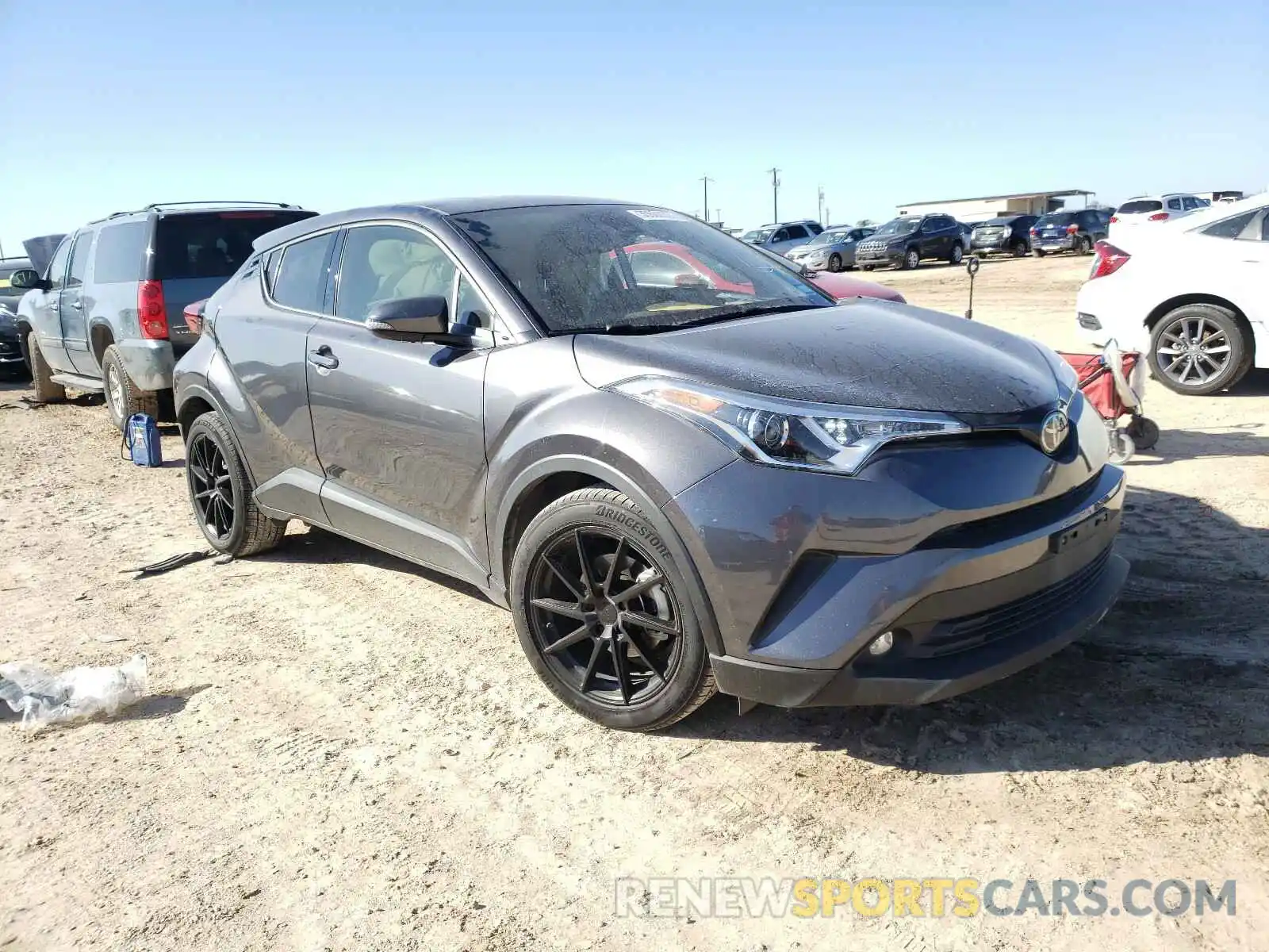 1 Фотография поврежденного автомобиля JTNKHMBX4K1043364 TOYOTA C-HR 2019