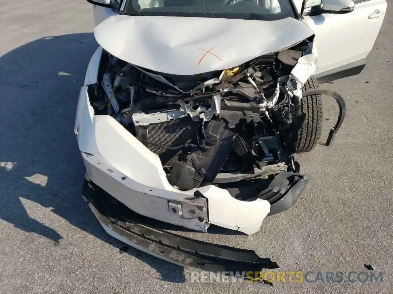 12 Photograph of a damaged car JTNKHMBX4K1055319 TOYOTA C-HR 2019