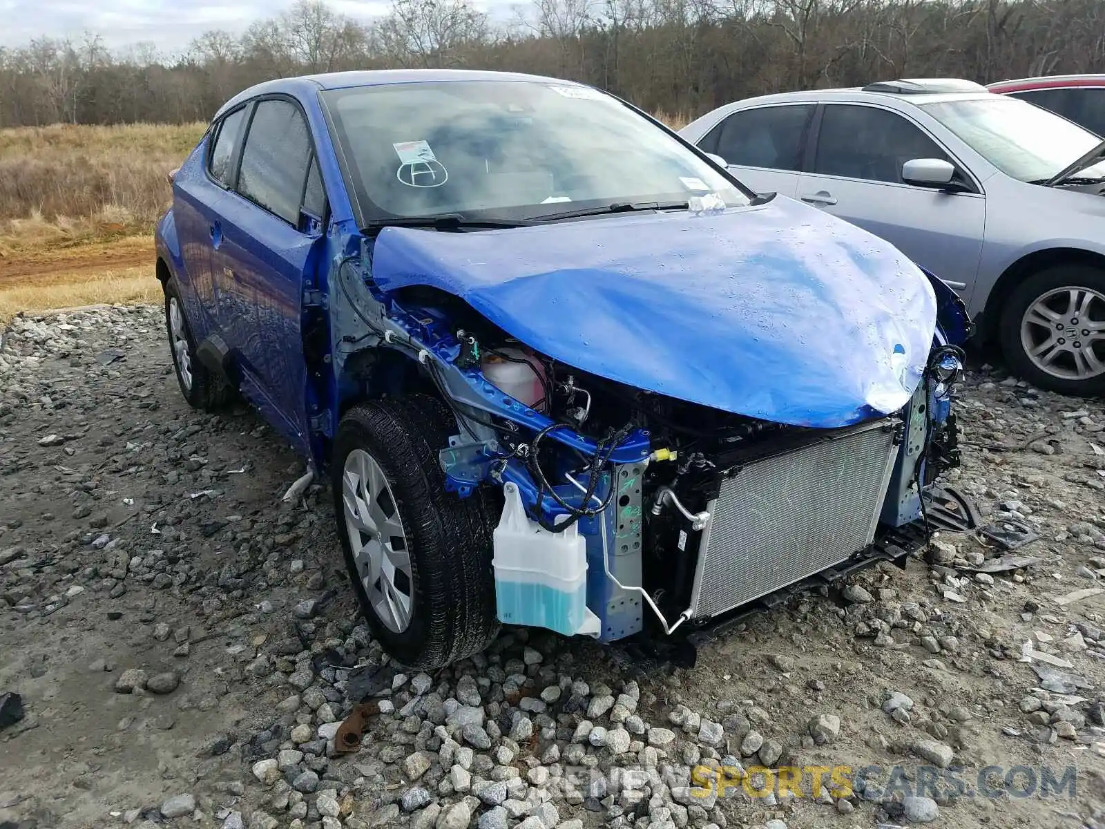 1 Фотография поврежденного автомобиля JTNKHMBX4K1060410 TOYOTA C-HR 2019
