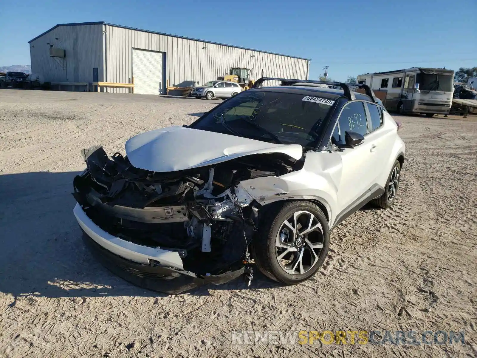 2 Photograph of a damaged car JTNKHMBX5K1032597 TOYOTA C-HR 2019