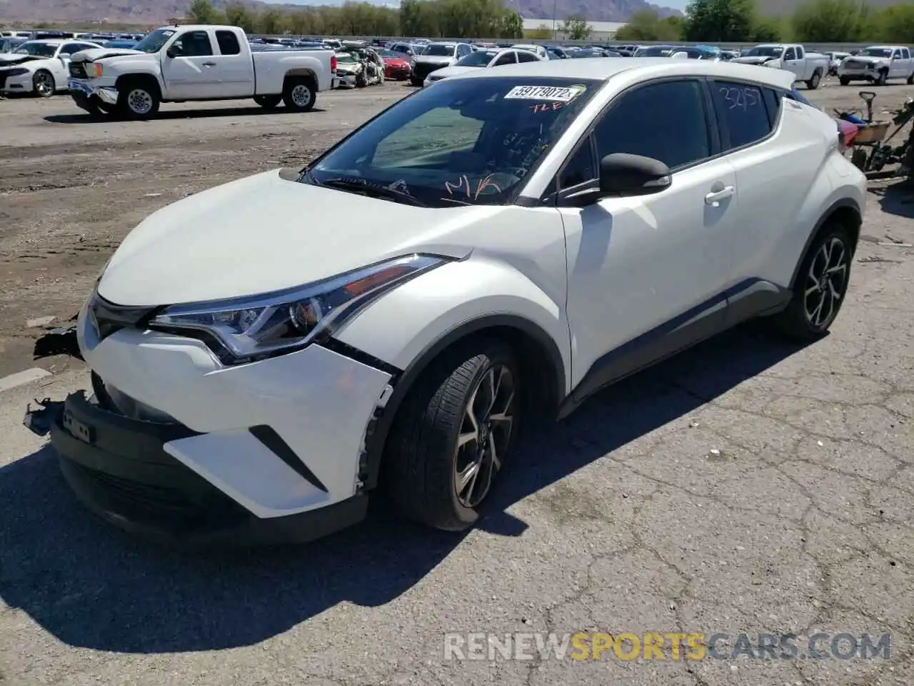 2 Photograph of a damaged car JTNKHMBX5K1057399 TOYOTA C-HR 2019