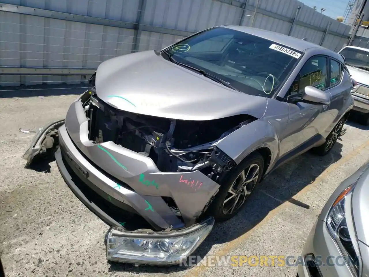 2 Photograph of a damaged car JTNKHMBX6K1039932 TOYOTA C-HR 2019