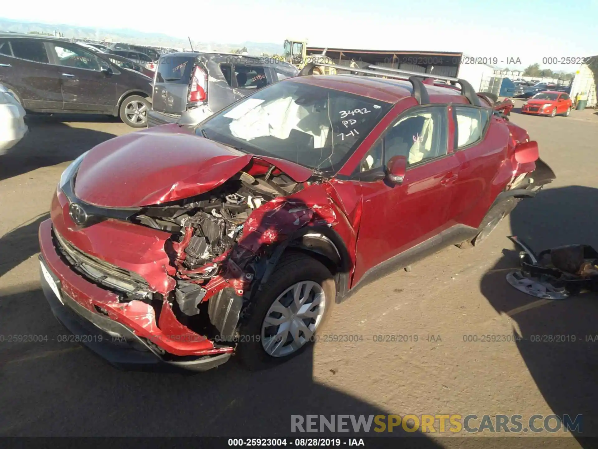 2 Photograph of a damaged car JTNKHMBX6K1041700 TOYOTA C-HR 2019