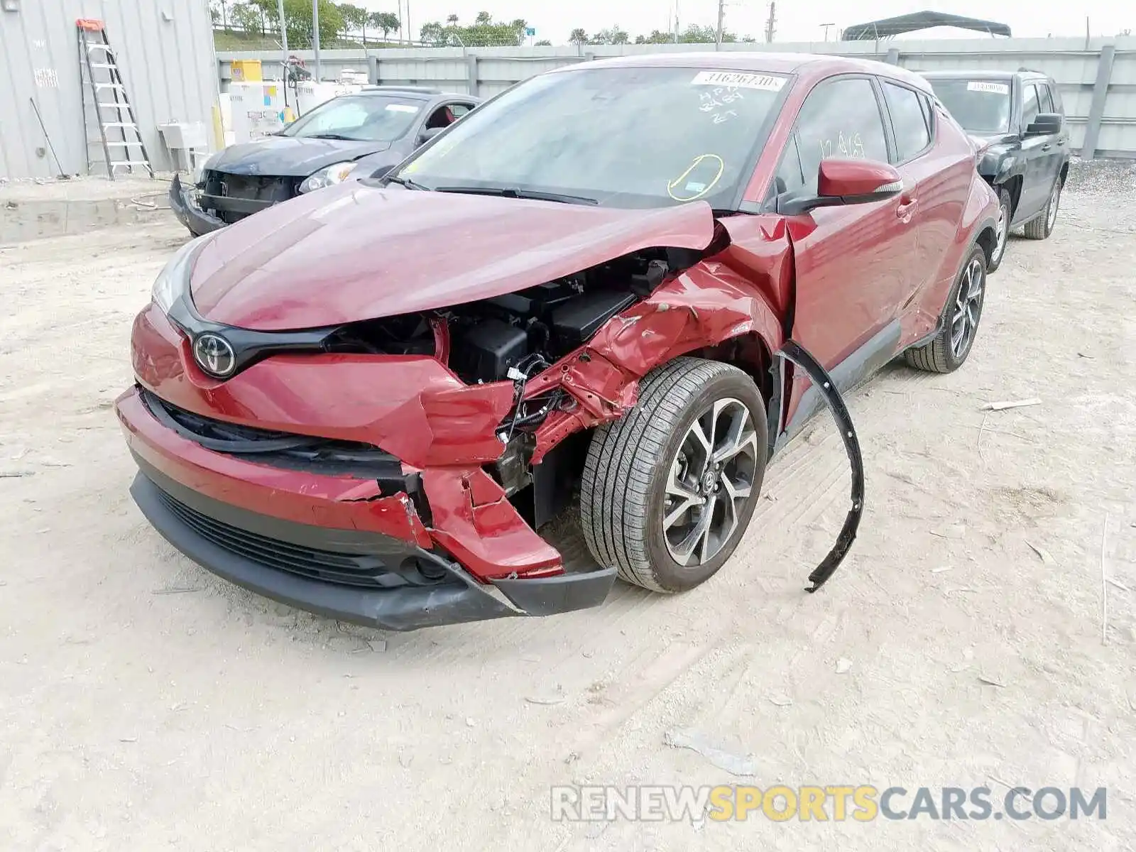 2 Photograph of a damaged car JTNKHMBX6K1048484 TOYOTA C-HR 2019