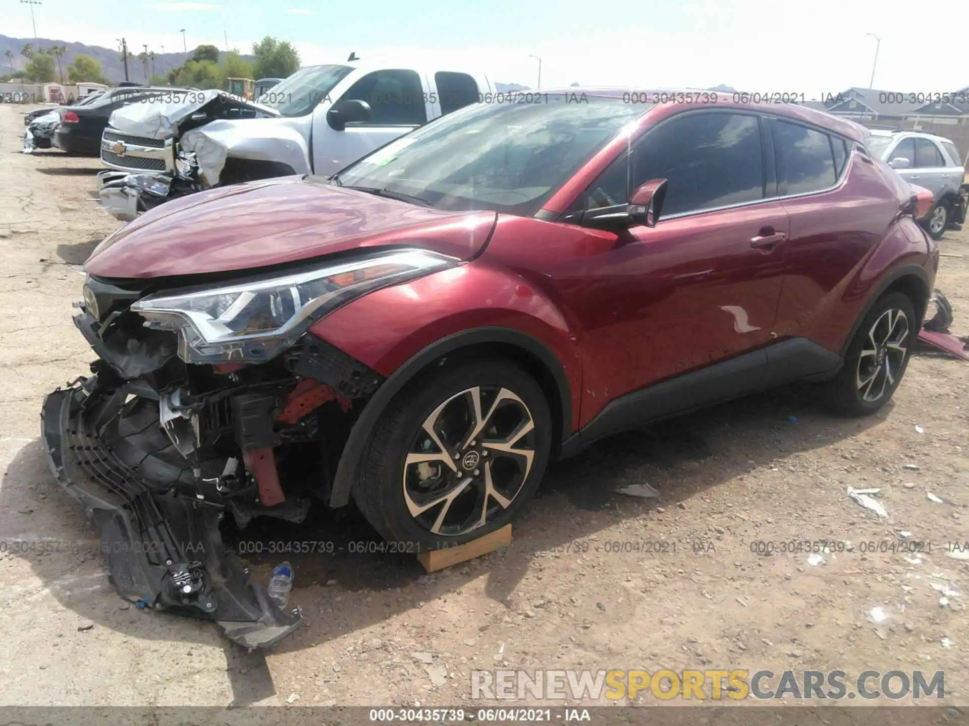 2 Фотография поврежденного автомобиля JTNKHMBX7K1021889 TOYOTA C-HR 2019