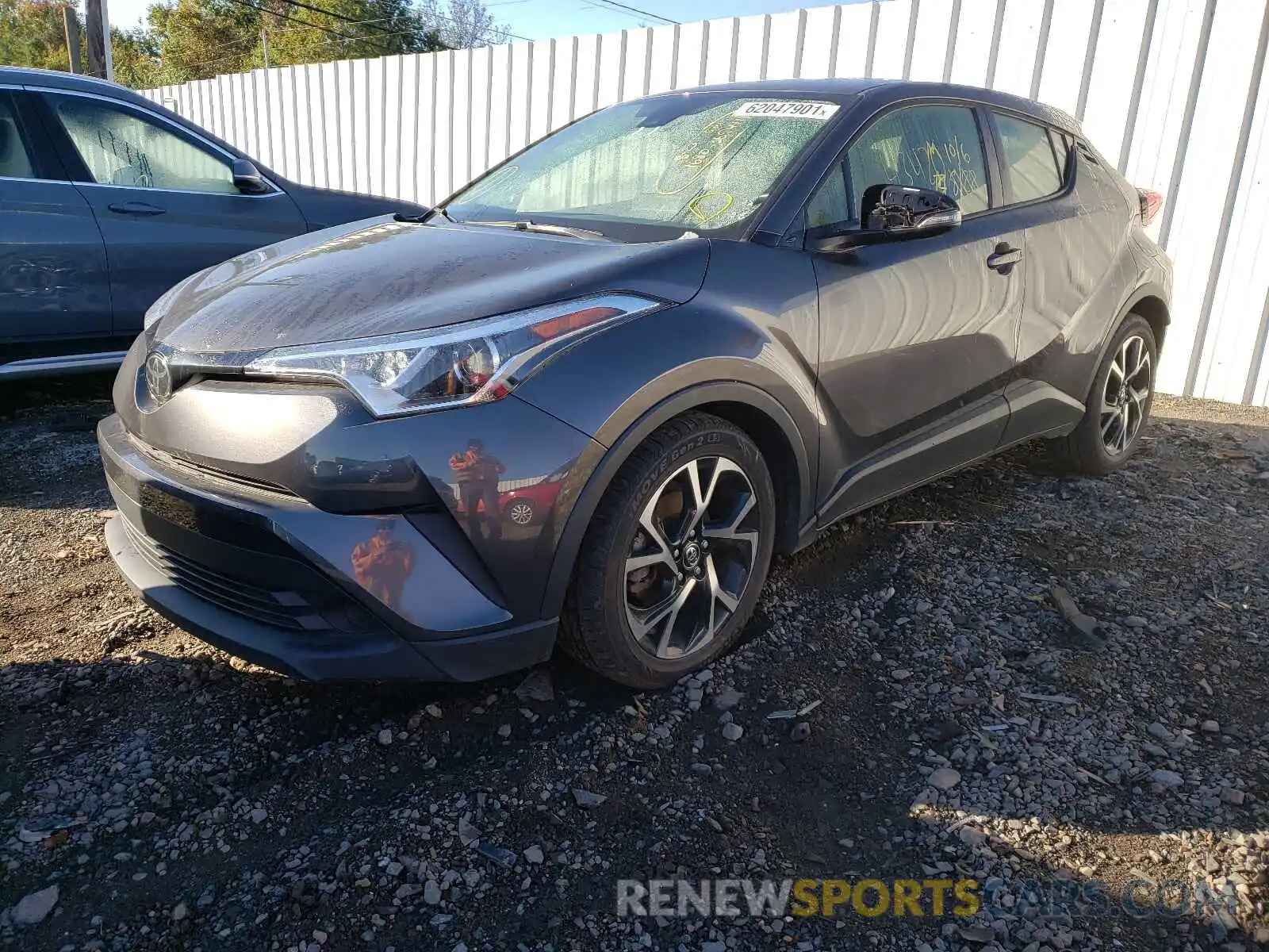 2 Photograph of a damaged car JTNKHMBX7K1036201 TOYOTA C-HR 2019