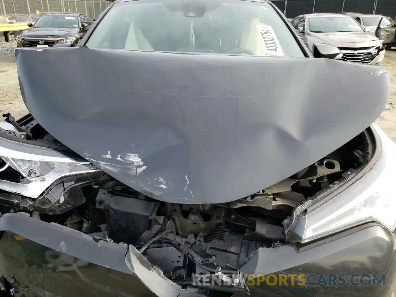 11 Photograph of a damaged car JTNKHMBX7K1044699 TOYOTA C-HR 2019