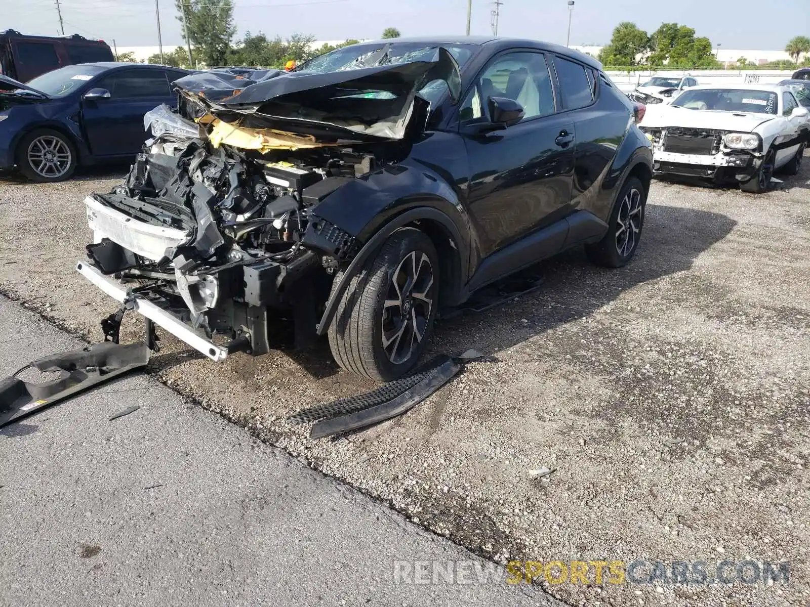 2 Photograph of a damaged car JTNKHMBX7K1057615 TOYOTA C-HR 2019